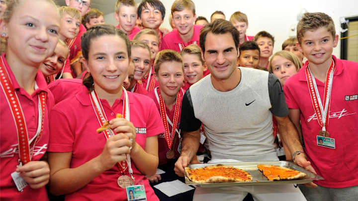 Roger Federer buys ball kids pizza after winning Basel Open