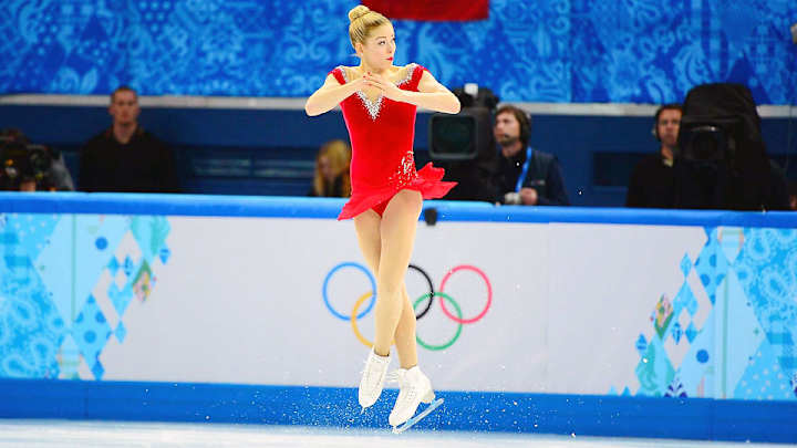 Race to be figure skating's queen filled with bumps, bruises in short program