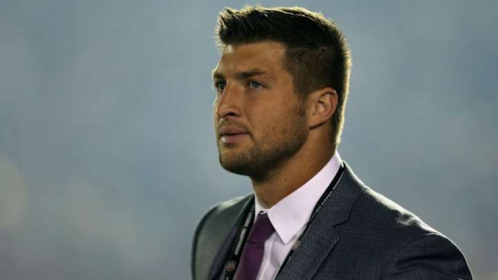Tim Tebow surprises family by paying Walmart layaway bill Tim Tebow surprises family by paying Walmart layaway bill