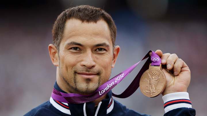 Tokyo Olympic board adds women, pop music producer