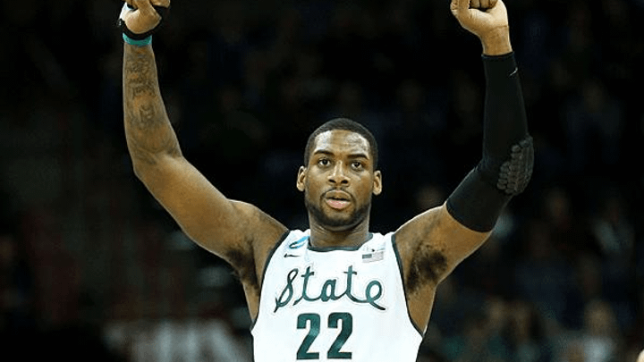 Michigan State fights off Harvard to advance to Sweet 16