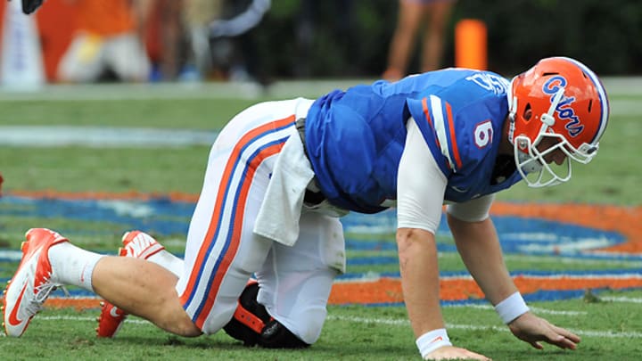 NCAA approves 15-yard penalty for low hits on quarterbacks