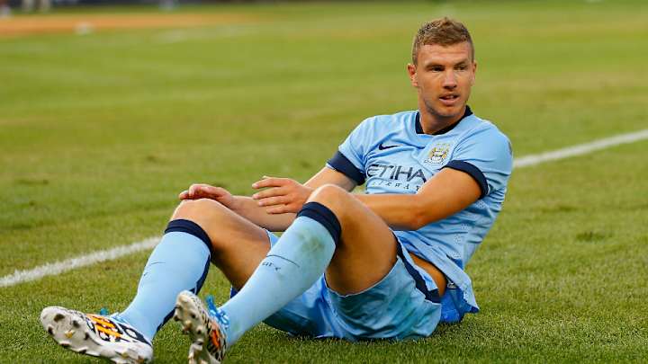 Edin Dzeko, Manchester City agree to new four-year deal