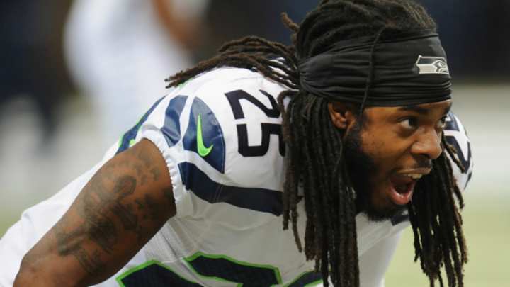 Richard Sherman fined by the NFL for his choking gesture Richard Sherman fined by the NFL for his choking gesture