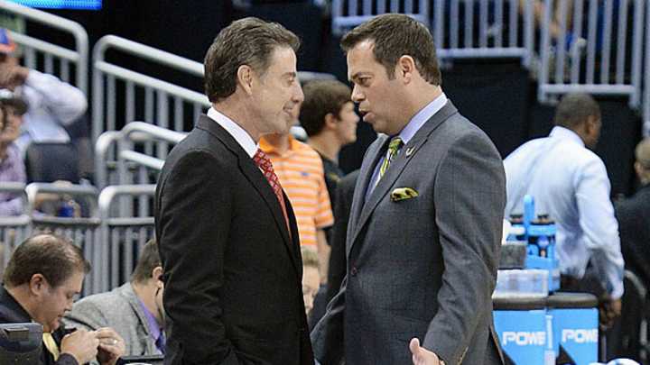 Louisville scratches out win over Manhattan team that has familiar look