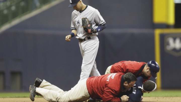 Fan Attempts to Hug Derek Jeter During Game, Gets Tackled Fan Attempts to Hug Derek Jeter During Game, Gets Tackled