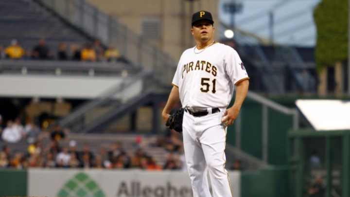 Pirates P Wandy Rodriguez designated for assignment to make room for C Russell Martin