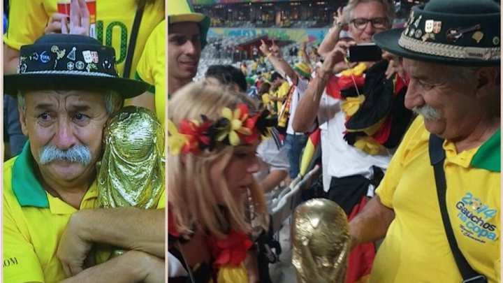 The sad Brazilian man clutching the World Cup trophy handed it over to a Germany fan The sad Brazilian man clutching the World Cup trophy handed it over to a Germany fan