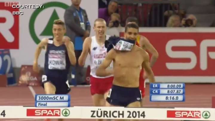 Runner disqualified after win for removing shirt during race's final 100m