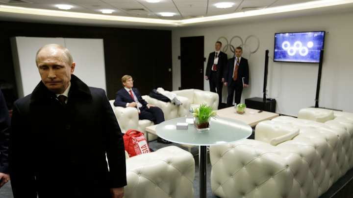 Photos: Putin probably missed Olympic rings glitch