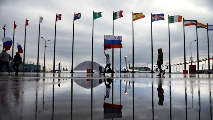 AP PHOTOS: Olympic flame at center stage in Sochi AP PHOTOS: Olympic flame at center stage in Sochi