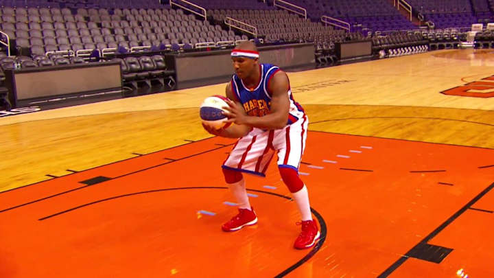 Harlem Globetrotter sets world record for longest backwards shot