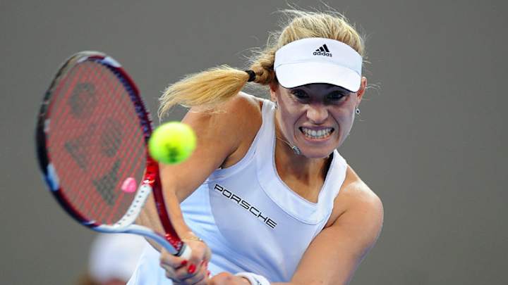 Kerber defeats Stosur to send Germany into Fed Cup finals