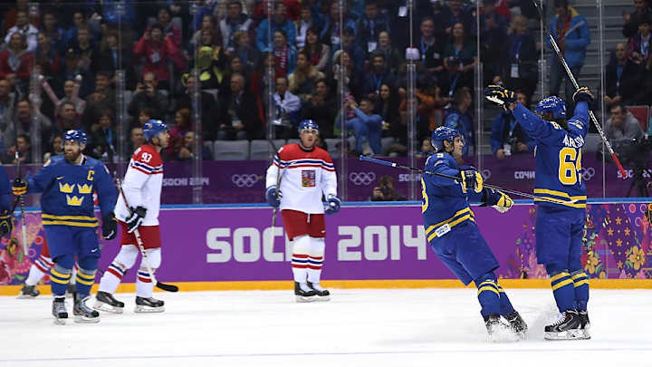Karlsson helps Sweden top Czech Republic, 4-2, in Olympic opener