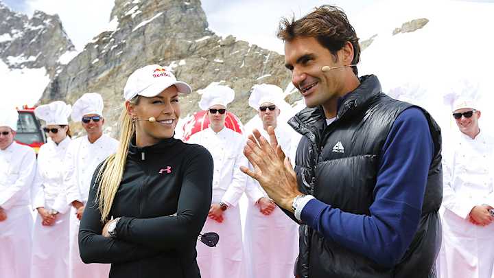 Roger Federer and Lindsay Vonn play tennis on a glacier in the Swiss Alps