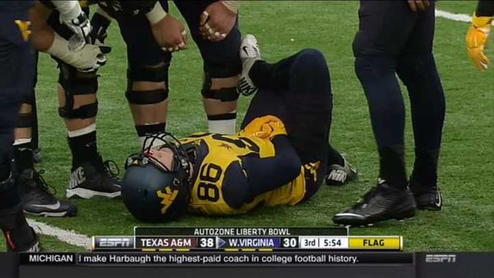 West Virginia kicker hit below the belt on field goal block attempt