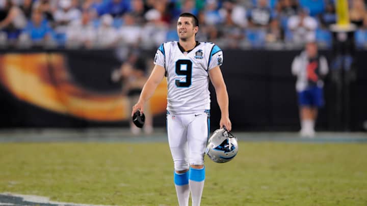 Panthers K Graham Gano practices in the middle of halftime performers