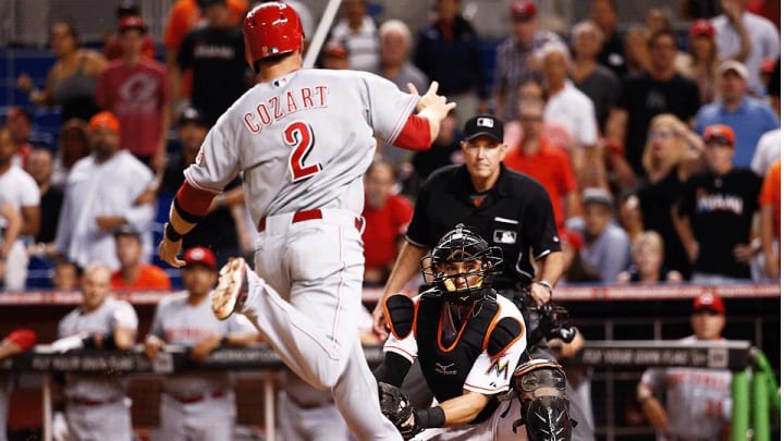 Reds beat Marlins after double play is controversially overturned
