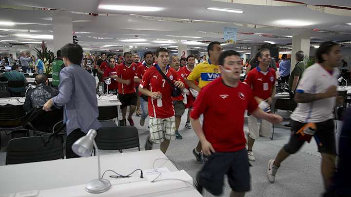 Chilean fans storm Maracana Stadium ahead of match against Spain Chilean fans storm Maracana Stadium ahead of match against Spain
