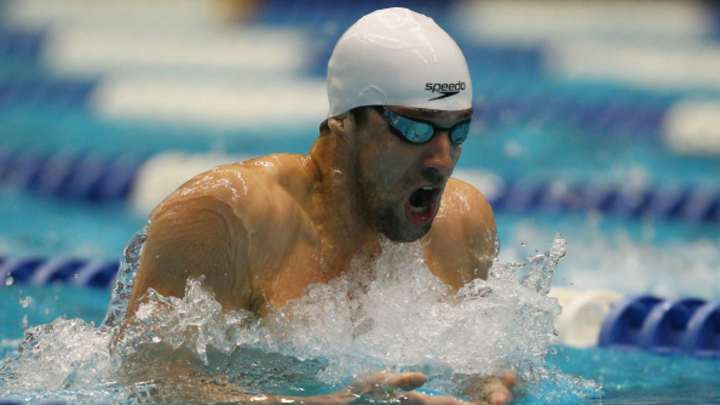 Michael Phelps will return to competition in April