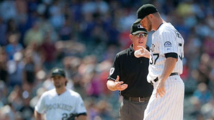 Rockies reliever Nick Masset suspended three games for throwing at Braves' Evan Gattis