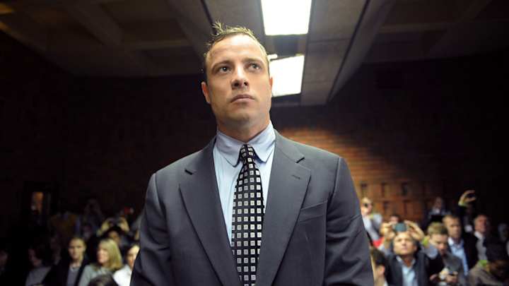 Pistorius settles in alleged assault case