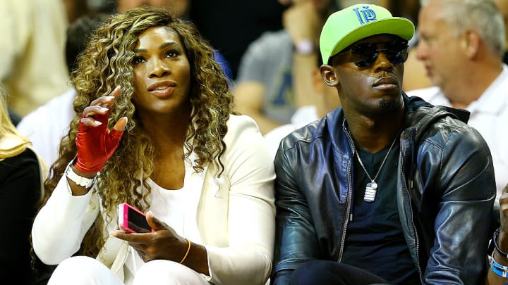Serena Williams sits courtside with Usain Bolt at Game 4 of the NBA Finals