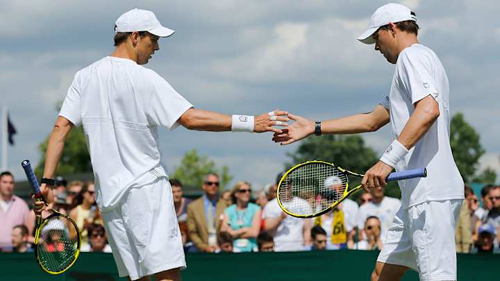 Bryan brothers win first-round match at Wimbledon