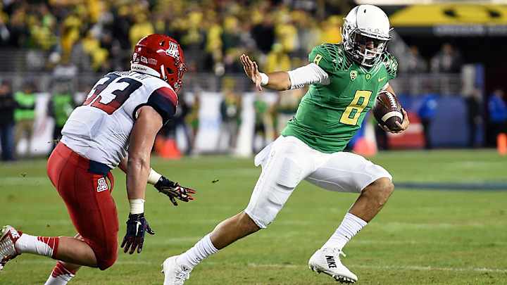 How does Marcus Mariota stack up to past Heisman Trophy quarterbacks? How does Marcus Mariota stack up to past Heisman Trophy quarterbacks?