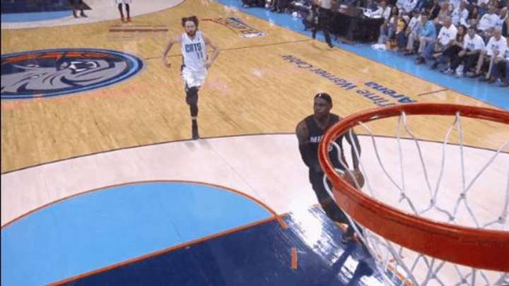 Video: Heat's LeBron James glances at Bobcats owner Michael Jordan before dunk?