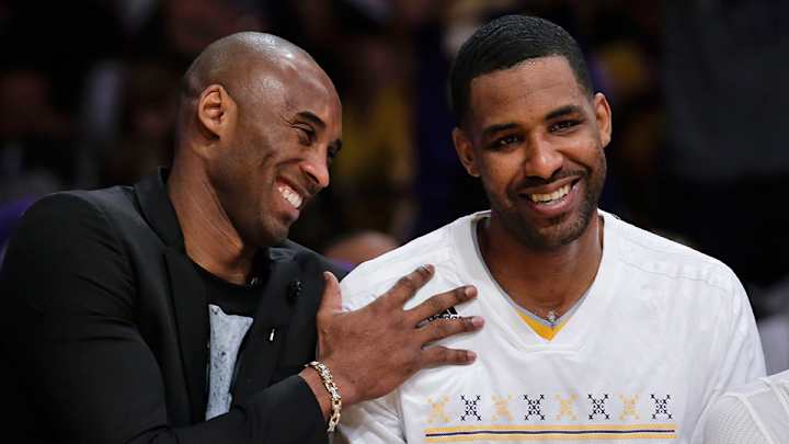 Report: Kobe Byrant happy with Lakers' free agency moves