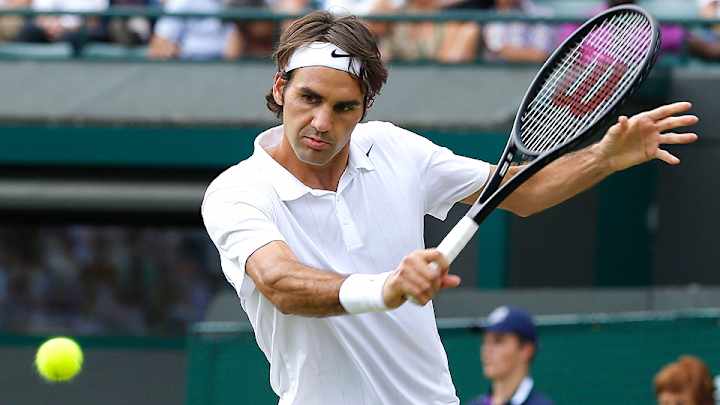 Federer back into Wimbledon quarters for 12th time