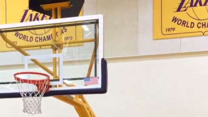 Here's Iggy Azalea hitting a behind-the-backboard shot