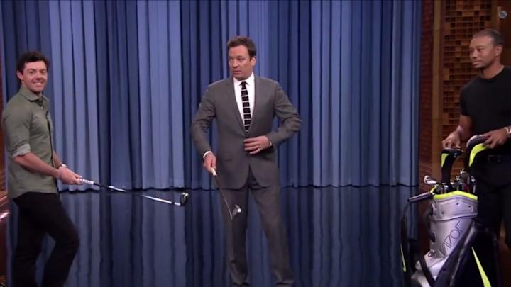 Jimmy Fallon took on Rory McIlroy in a chipping contest with Tiger Woods acting as his caddy Jimmy Fallon took on Rory McIlroy in a chipping contest with Tiger Woods acting as his caddy