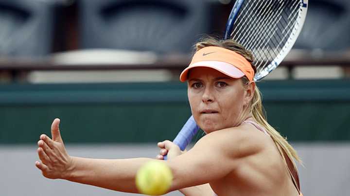 Maria Sharapova rallies to beat Garbine Muguruza in French Open quarterfinals