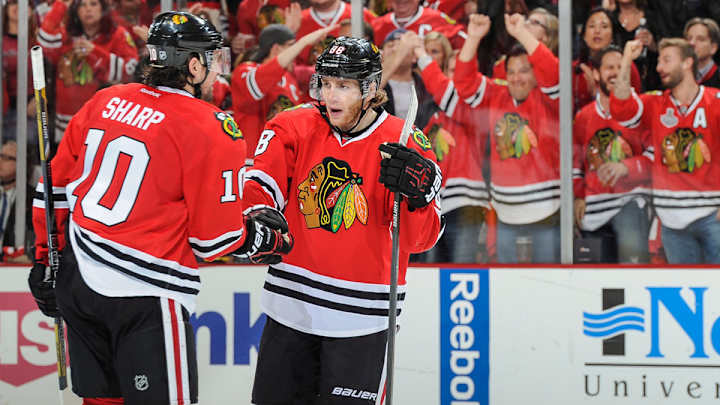 Blackhawks wingers Patrick Sharp, Patrick Kane get stitches to face