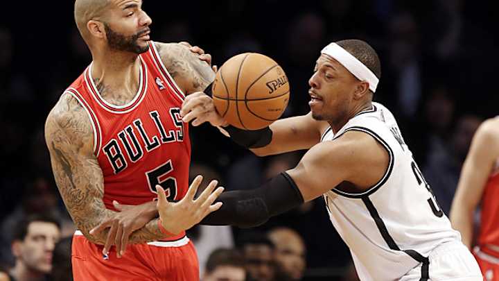 Nets tighten defense to slow Bulls, reverse seemingly lost season