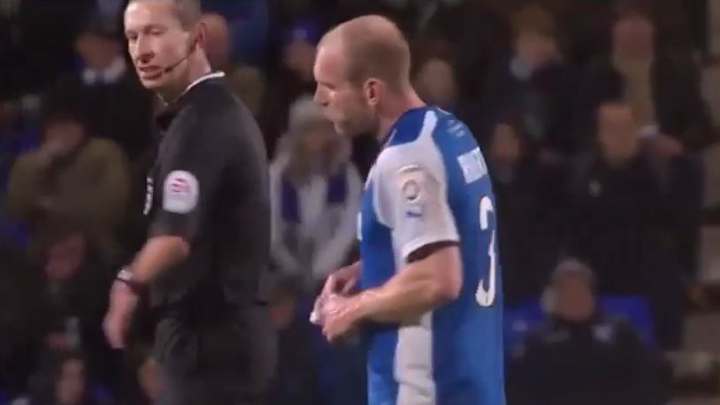 An English soccer player ate some cookies on the field
