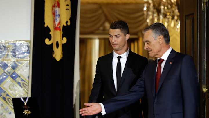 Cristiano Ronaldo receives medal from Portuguese president
