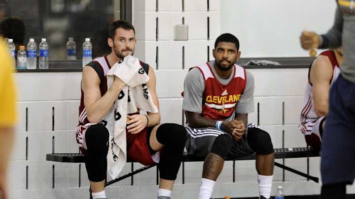 Kevin Love and Kyrie Irving's handshake goes up in smoke Kevin Love and Kyrie Irving's handshake goes up in smoke