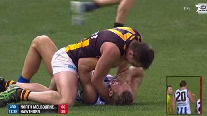 Aussie rules football player attempts to strangle opponent during match