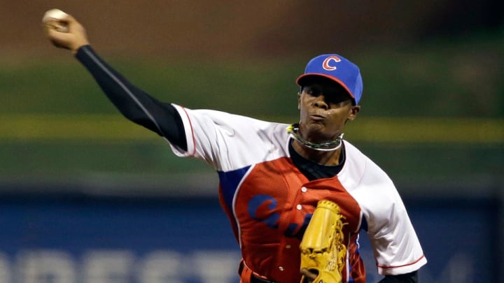 Reds sign Cuban pitcher Raicel Iglesias to seven-year deal