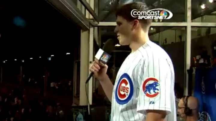 Bulls' Doug McDermott tries to sing during Cubs' 7th inning stretch, fails