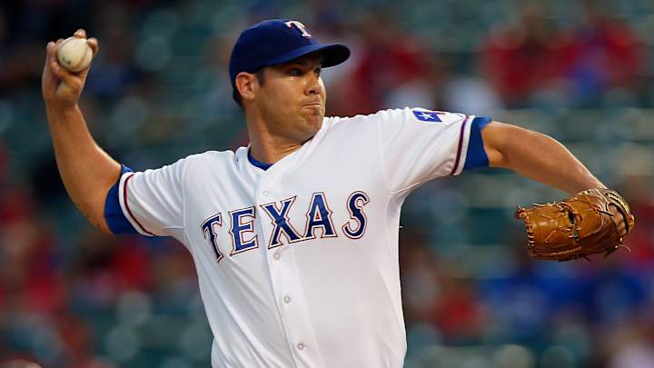 Rangers re-sign pitcher Colby Lewis to one-year deal
