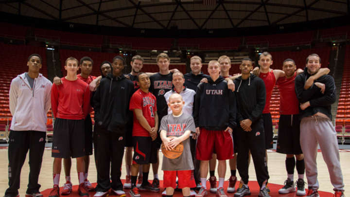 Utah basketball team finds a friend and mentor in 8-year-old Mac Brennan