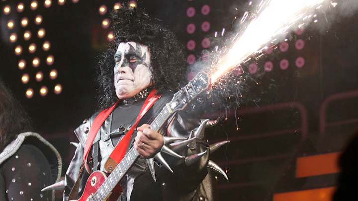 Tom Izzo dressed up as a member of KISS for Midnight Madness