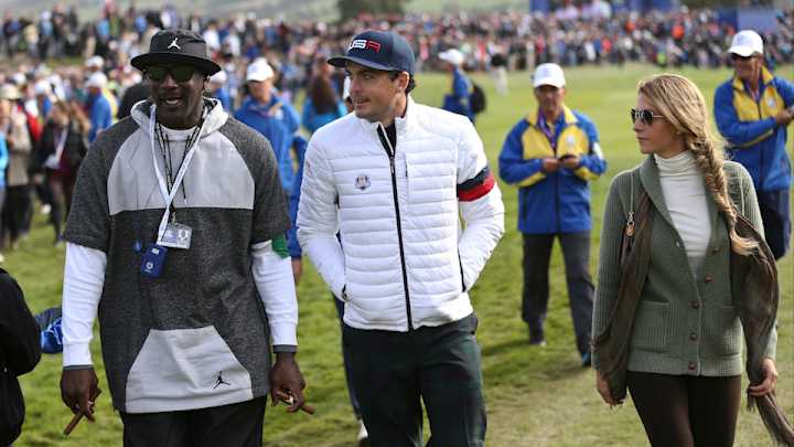 Michael Jordan double-fists cigars at Ryder Cup Michael Jordan double-fists cigars at Ryder Cup