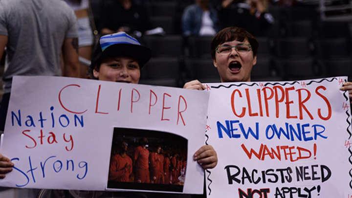 Photos: Donald Sterling controversy leads to signs and shirts at Staples Center