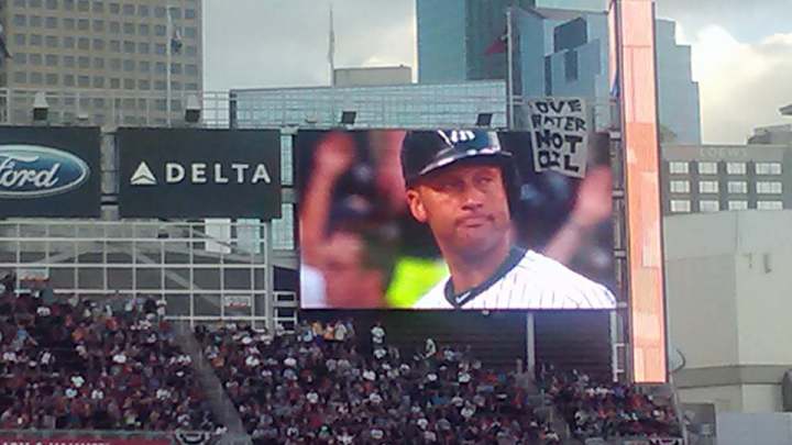 Activist obscures All-Star scoreboard with giant banner