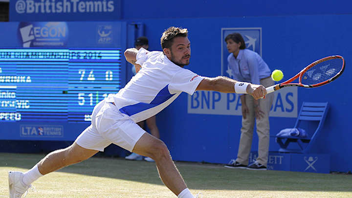 Wawrinka advances, Berdych bows out at Queen's Club